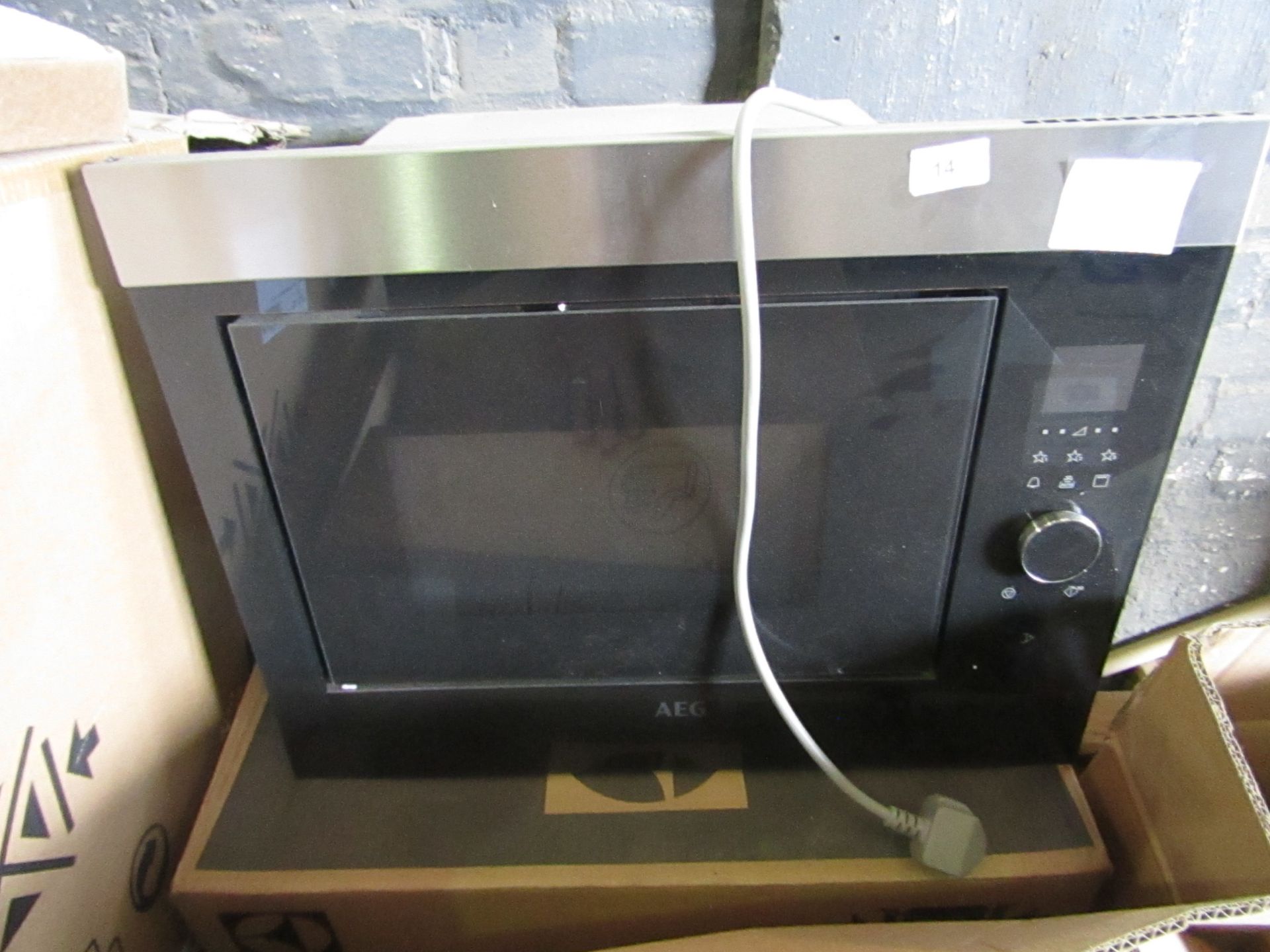 AEG Intergrated Microwave, works on basic check, with box