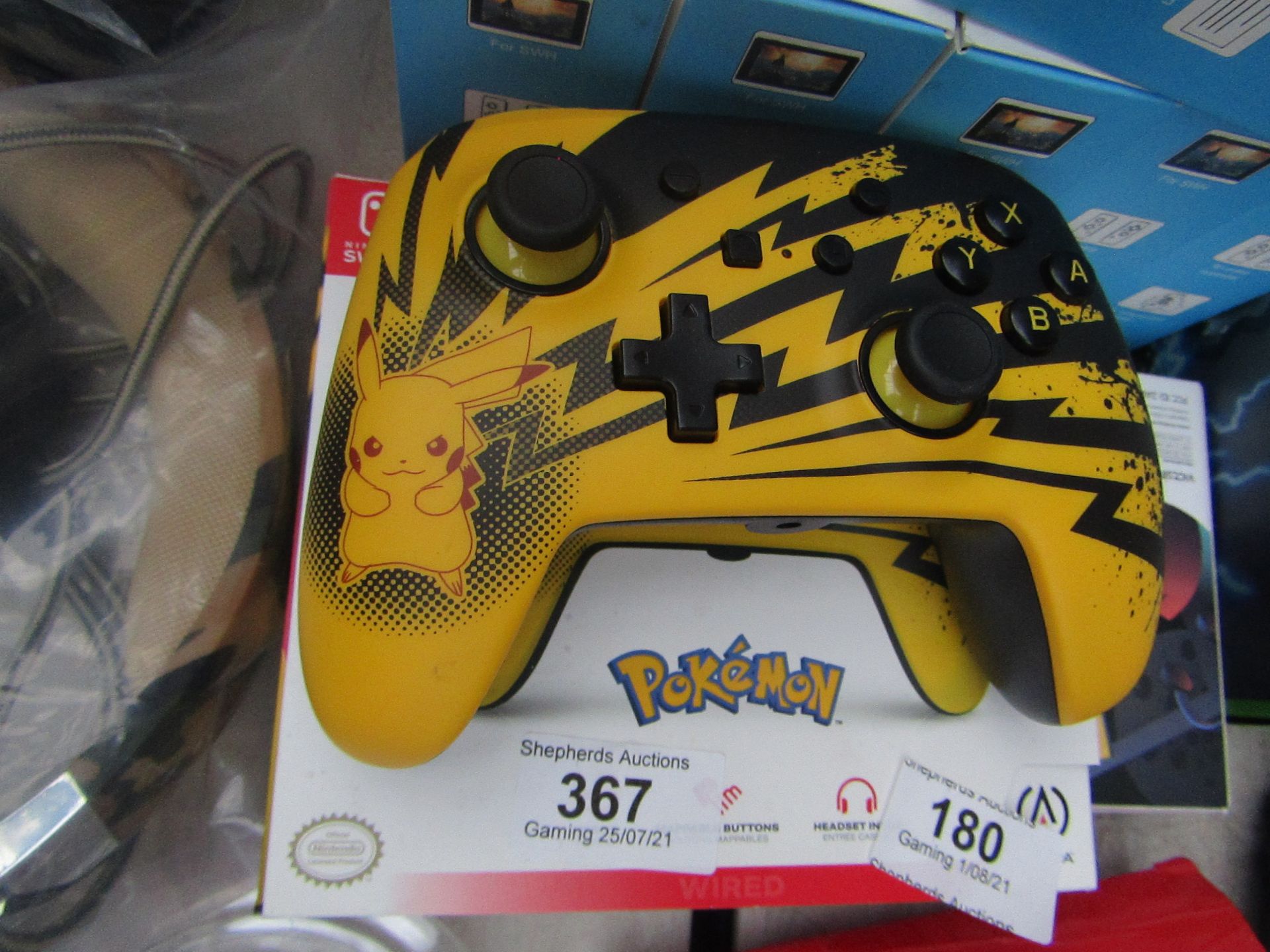 Power A Pokemon wired controller, comes with original box but he cable is missing.