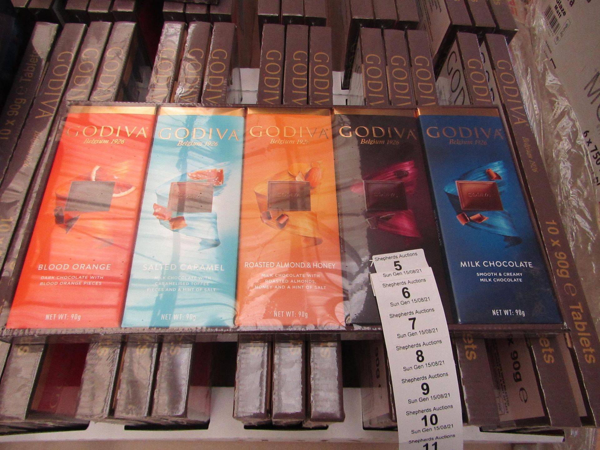 1X BOX CONTAINING 10 GODIVA CHOCOLATE BARS BLOOD ORANGE & SALTED CARAMEL & ROASTED ALMOND & 72%