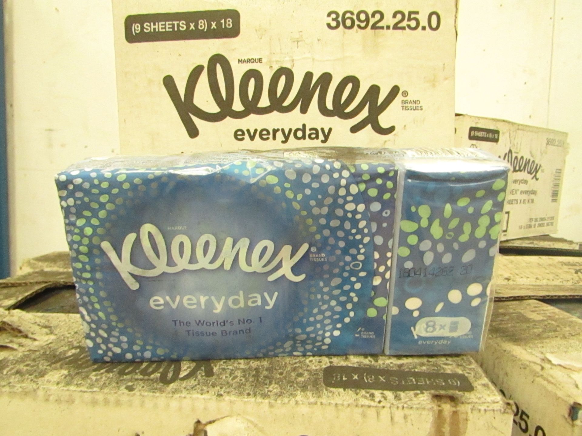 A Box Container 18x Packs Kleenex tissues, each pack has 8 packs of 9 sheets in them, the outer