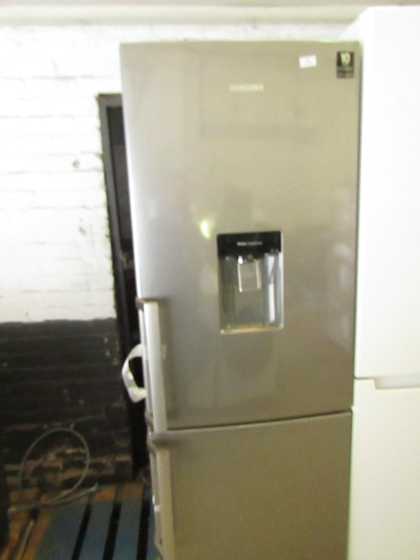 Samsung RS29FWJNDSA 60/40 fridge freezer with water dispenser, doesn't get cold.