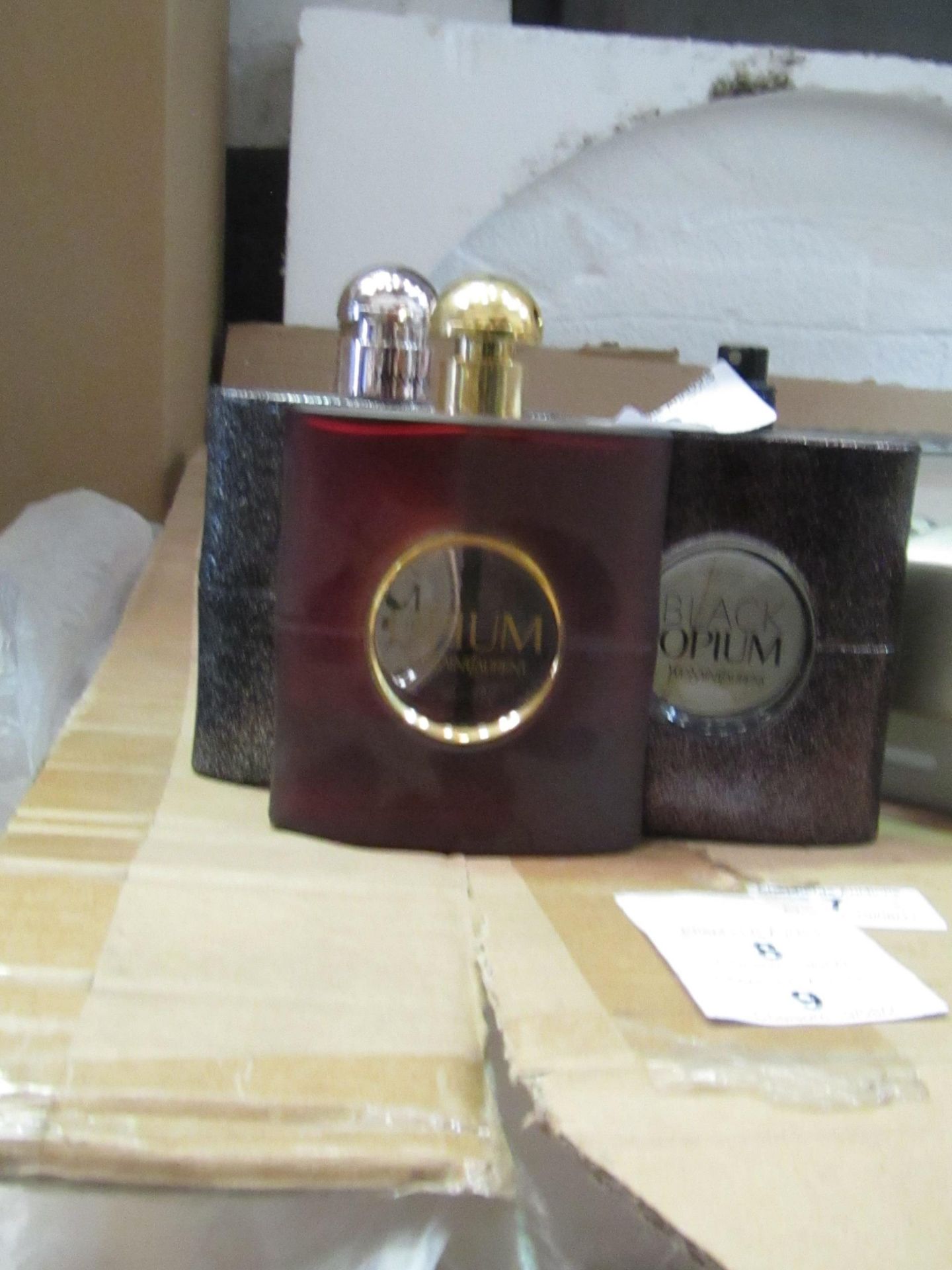 3x Bottles of Yves Saint Laurent Perfume - 2x Black Opium and 1x Opium - all around 20% full -