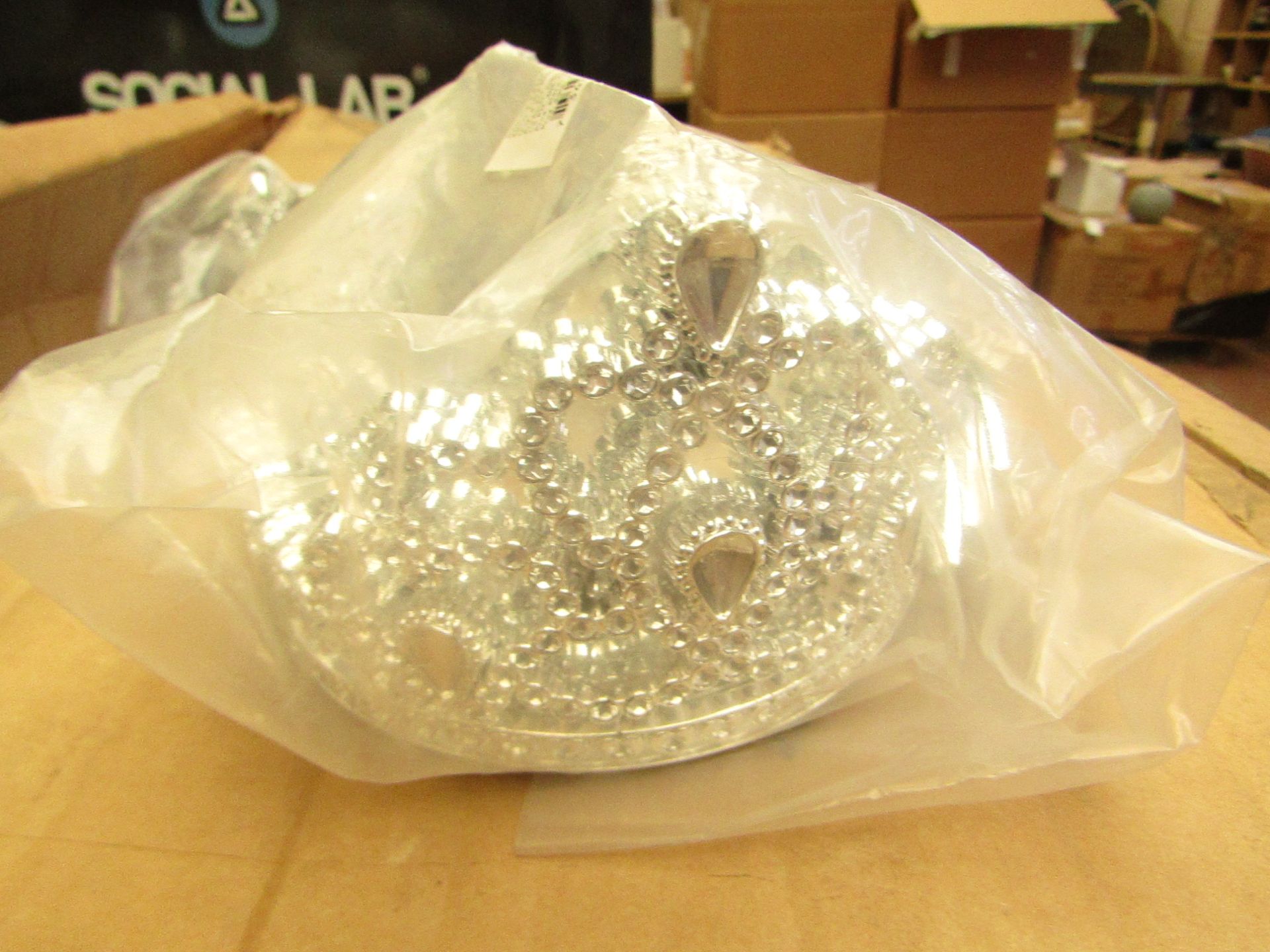 1X BOX OF SIVER TIARAS BLANK AND OVER THE HILL, APPROX 100PLUS IN BOX, NEW IN PACKAGE.