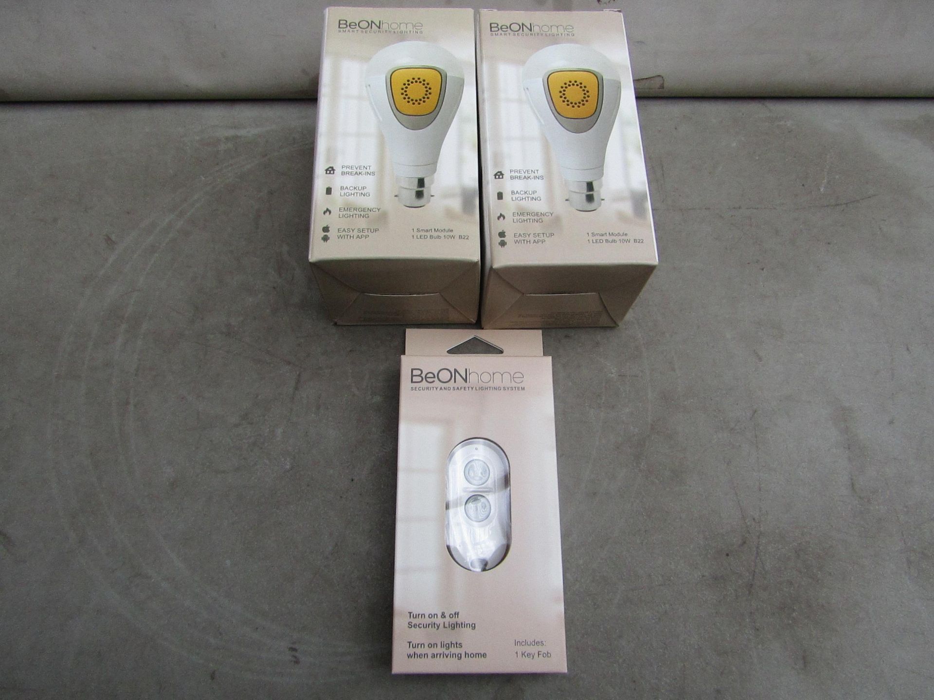 3x BeOn Home items being 2 Smart aop controlled Light Bulbs and a Blue tooth remote control