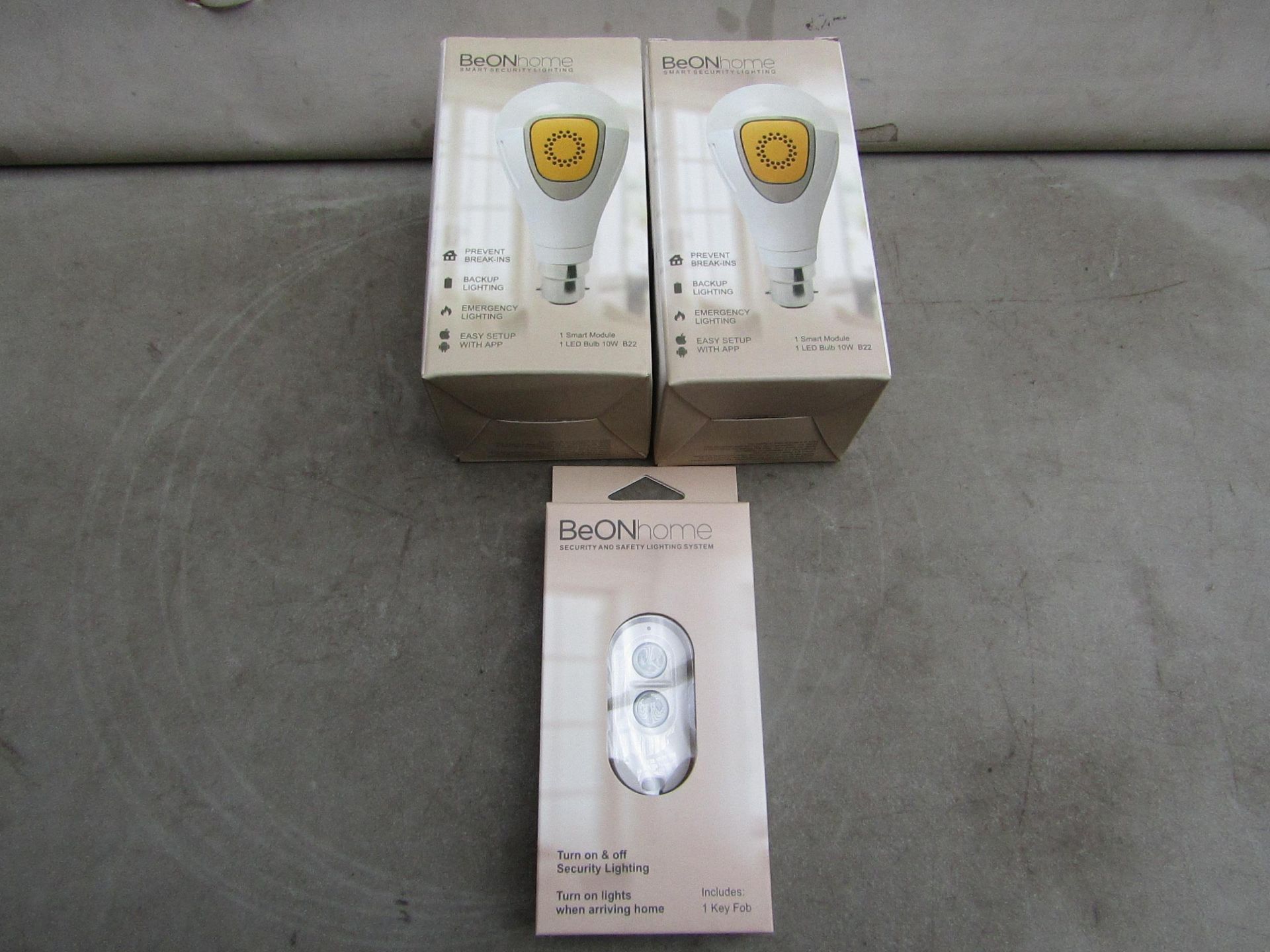 3x BeOn Home items being 2 Smart aop controlled Light Bulbs and a Blue tooth remote control