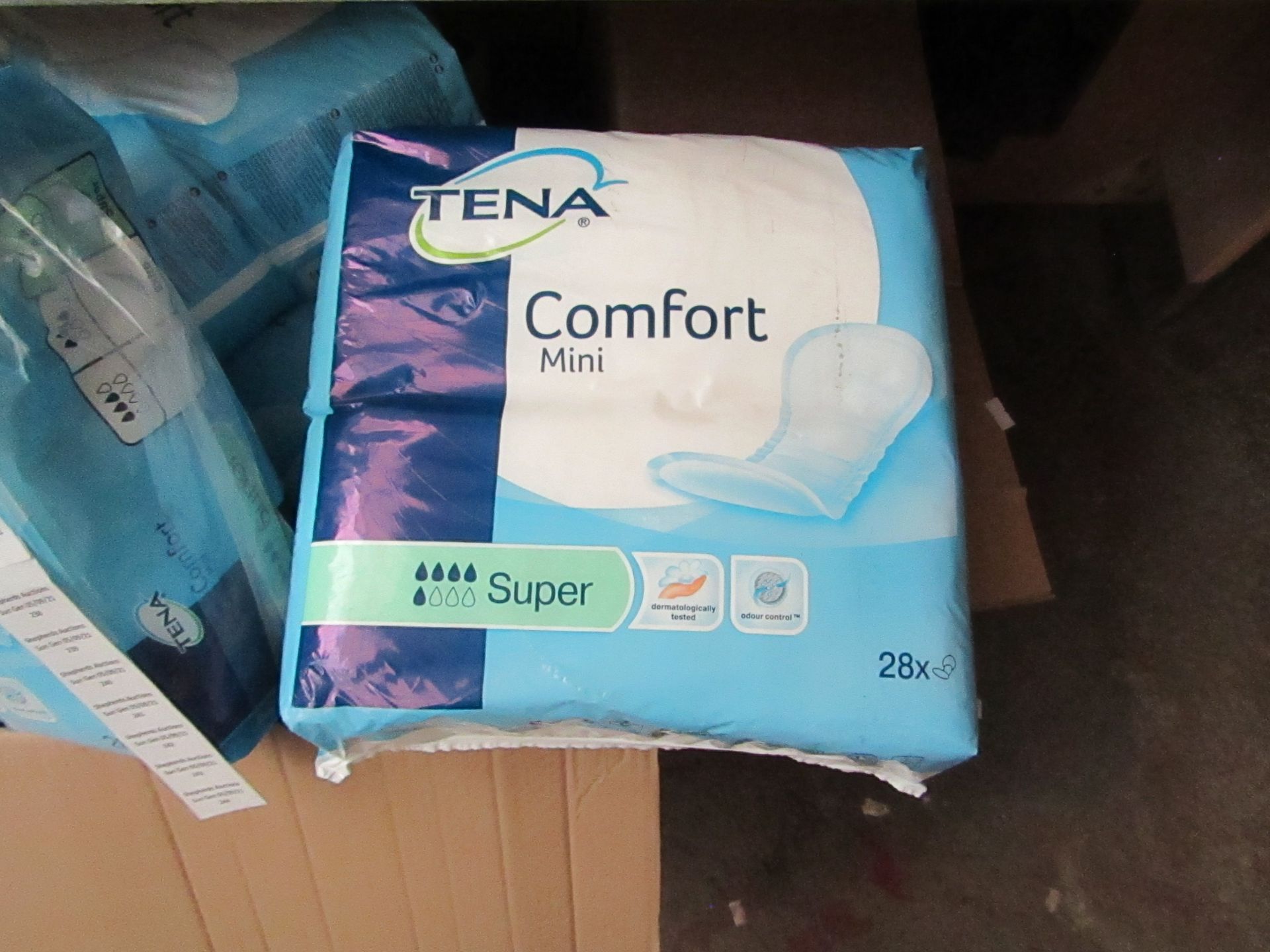 Tena - Comfort Mini Super (1x Pack of 28) - New & Packaged.