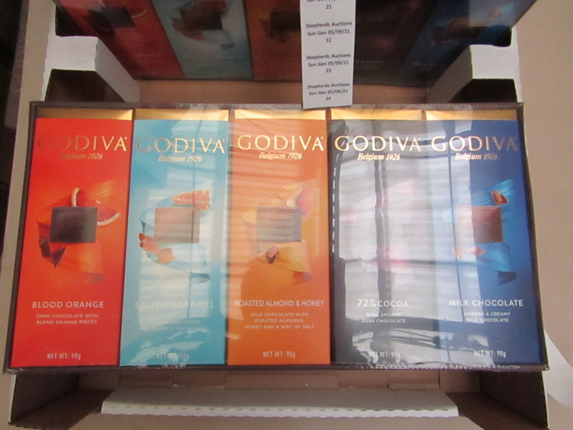 1X BOX CONTAINING 10 GODIVA CHOCOLATE BARS BLOOD ORANGE & SALTED CARAMEL & ROASTED ALMOND & 72%