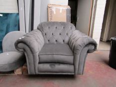 Costco velvet buttoned armchair, no major damage and is missing feet.