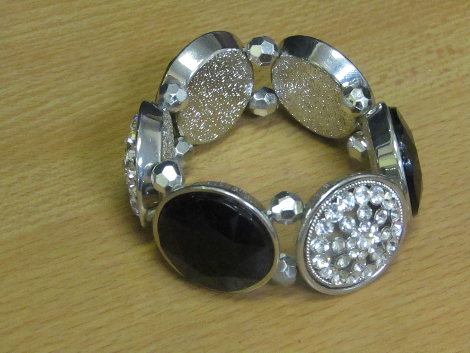 5x Womens dress bracelet - new & packaged.