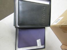 4x items being - 3x boca passport wallet black - 1x boca passport wallet purple - new & boxed.