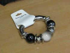 5x Womens dress bracelet - new & packaged.