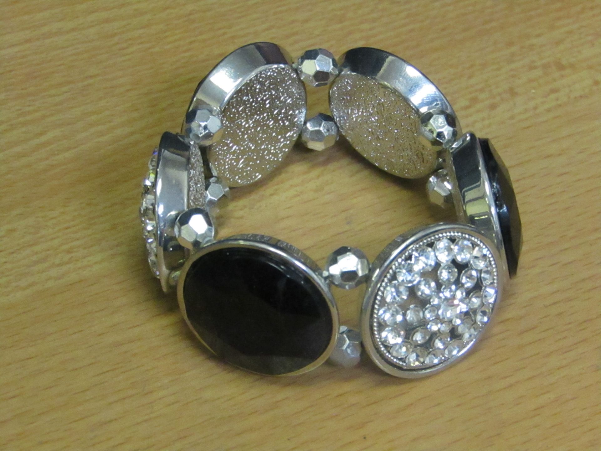 5x Womens dress bracelet - new & packaged.