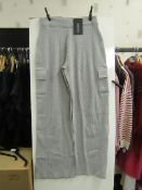 Pretty little thing ladies grey wide pocket casual trousers, size 14, new in packaging.
