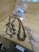 1x bag containing approx 15-20 womens jewelry items - new & packaged.