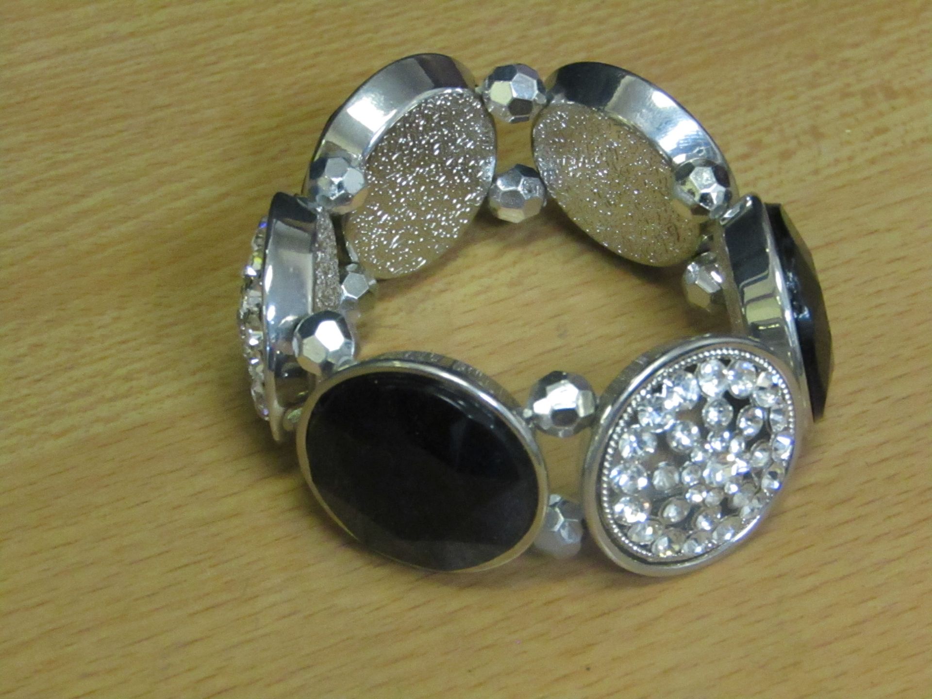 5x Womens dress bracelet - new & packaged.