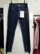 Unbranded ladies jeans, size 8, new with tags.