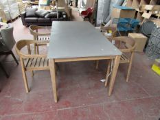 Indoor outdoor concrete topped dining table (no damage) and 4 Acacia dining chairs (one has small