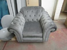 Costco velvet buttoned armchair, no major damage and is missing feet.