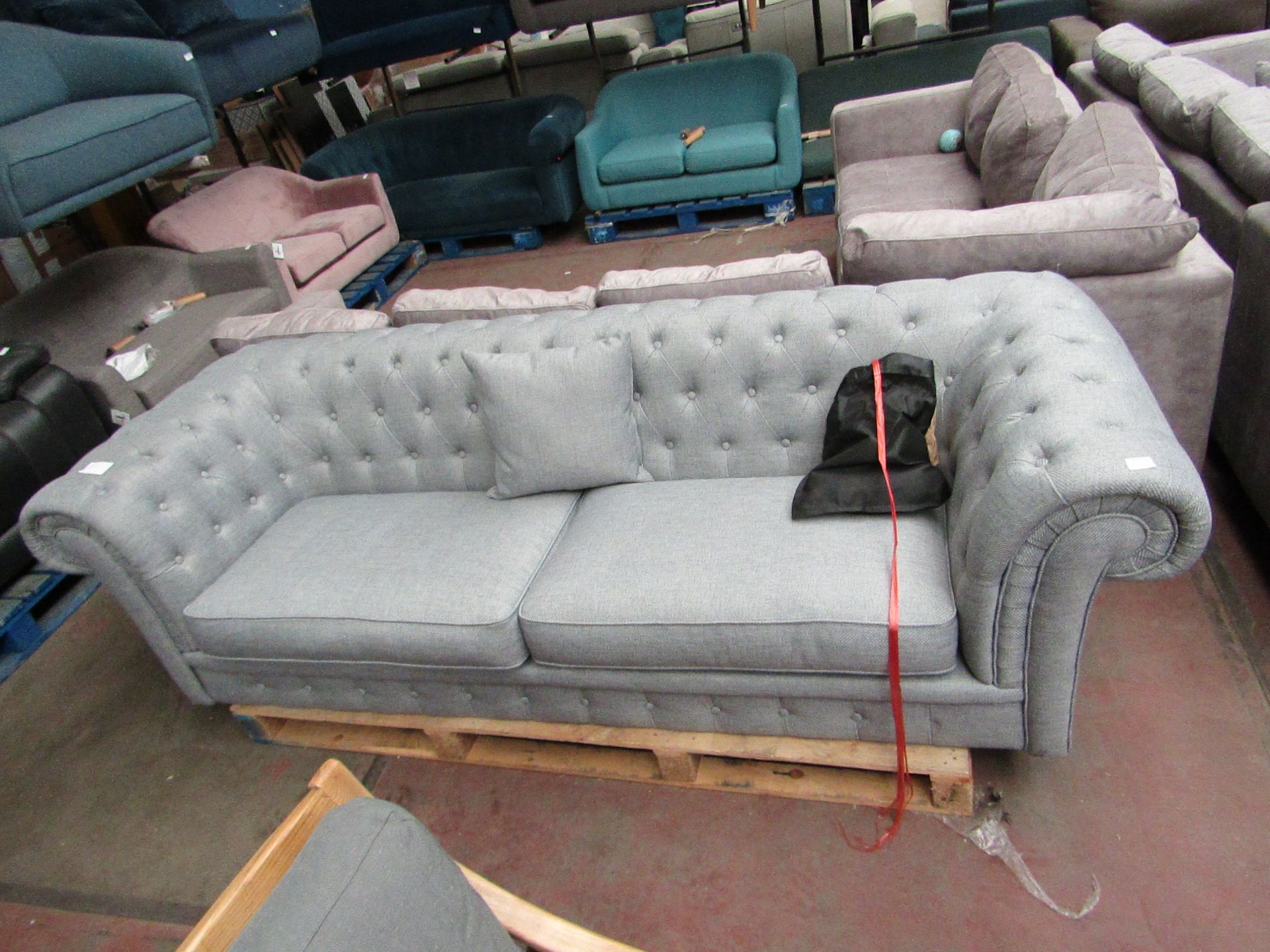 Costco Button Back 3 seater sofa with feet, no major damage.