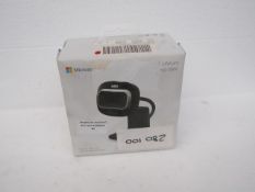 Microsoft 720p HD video chat, unchecked and boxed.