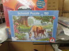 Schmidt puzzles, new and boxed.