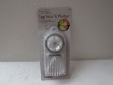 1X BOX CONTAINING APPROX 45 FIG & OLIVE EGG SLICER & WEDGER - NEW & PACKAGED.