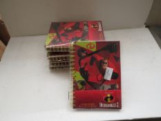 7x Incredibles notebooks, new and packaged.