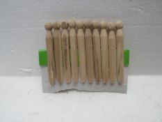 5x packs of 10 wooden pegs - unused.
