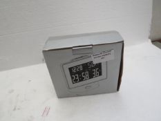 Table top alarm clock, new and boxed.