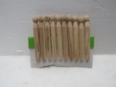 5x packs of 10 wooden pegs - unused.