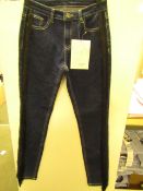 Unbranded ladies jeans, size 8, new with tags.