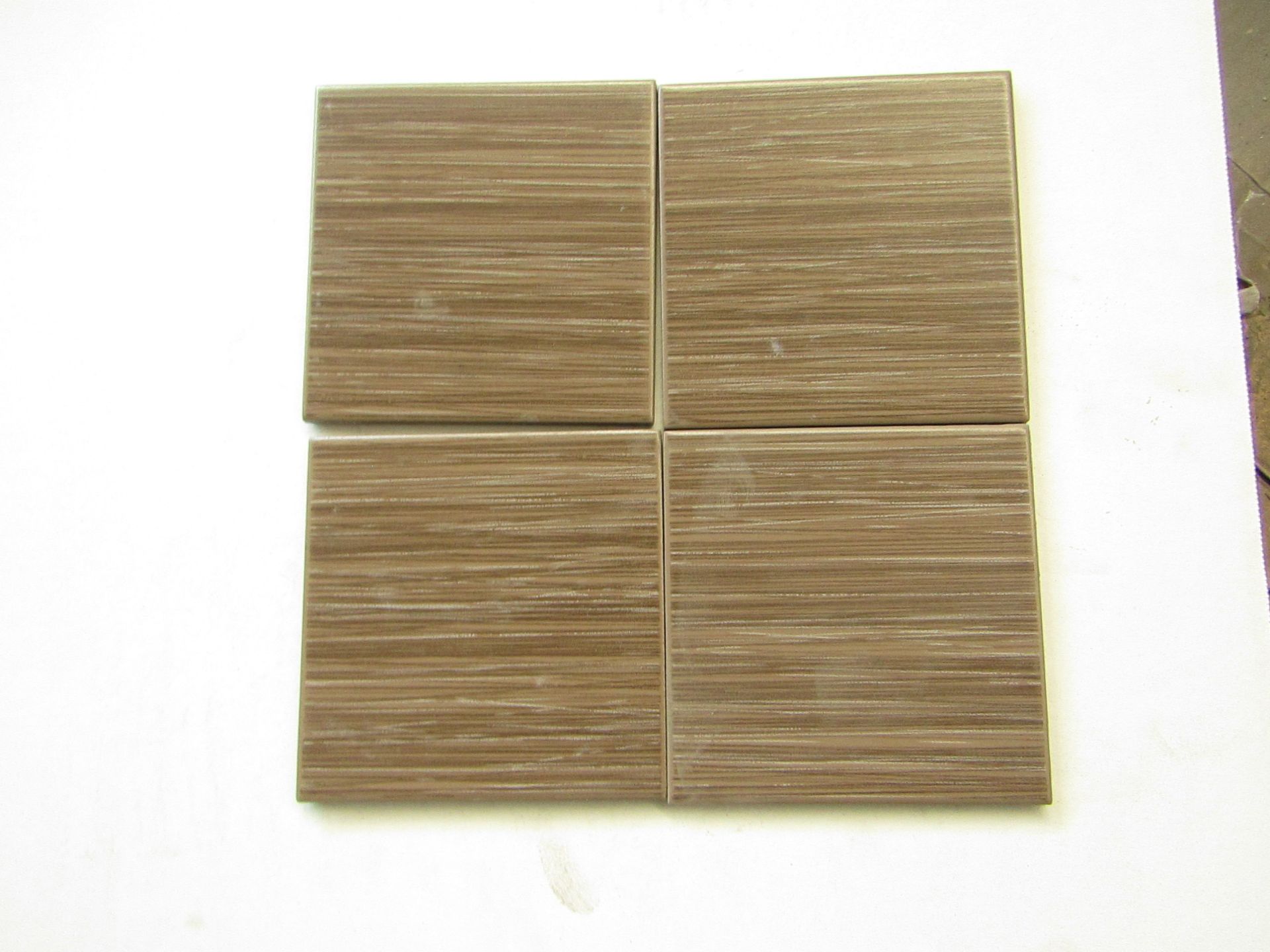 10x Boxes of 50 Vitra Elegant Mocha (K334411) tiles 100 x 100 x 6mm, brand new. Total RRP £22 a Box,