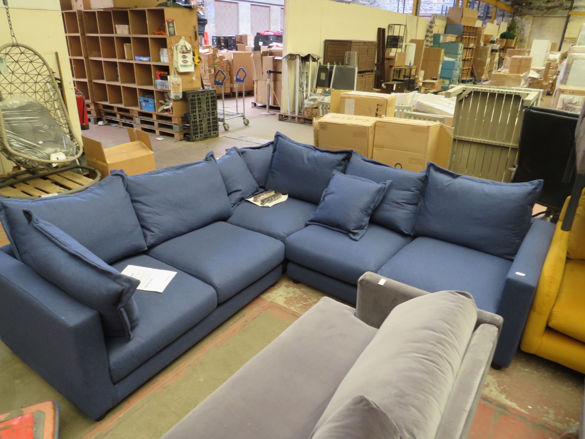 | 1X | MADE.COM BLUE FABRIC CORNER SOFA | HAS A RIP ON THE BACK OF THE SOFA | RRP - |