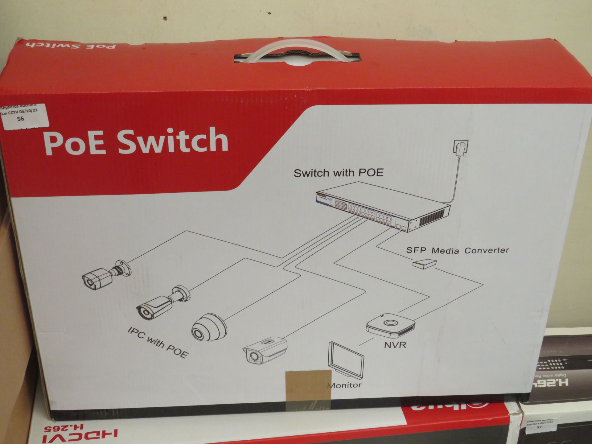 PoE Switch, unchecked and boxed.