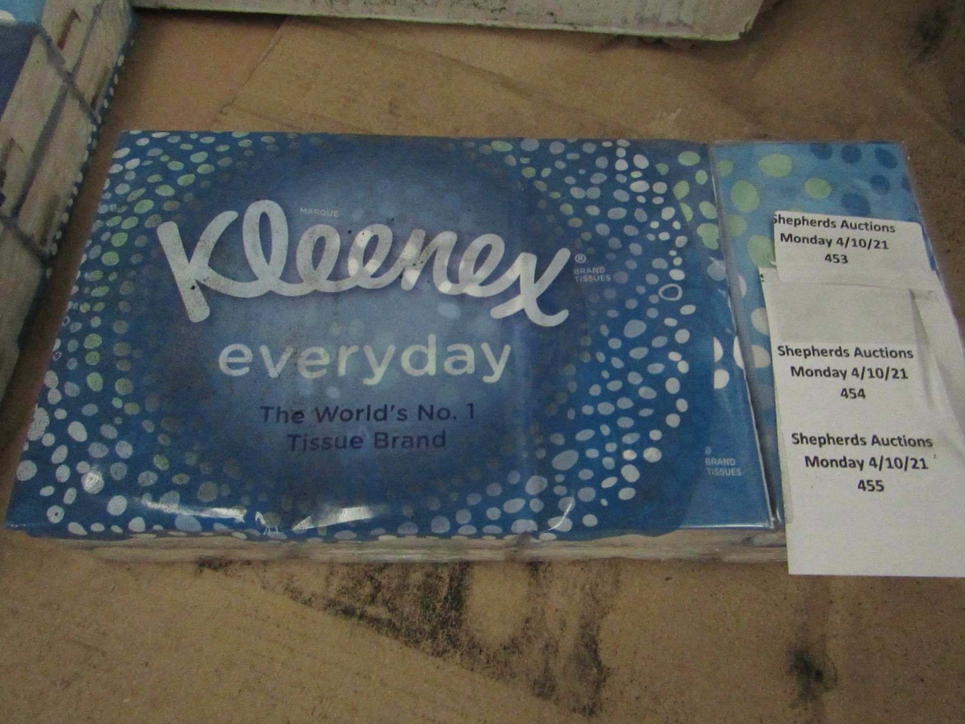A Box Container 18x Packs Kleenex tissues - Each pack has 8 packs of 9 sheets in them, the outer