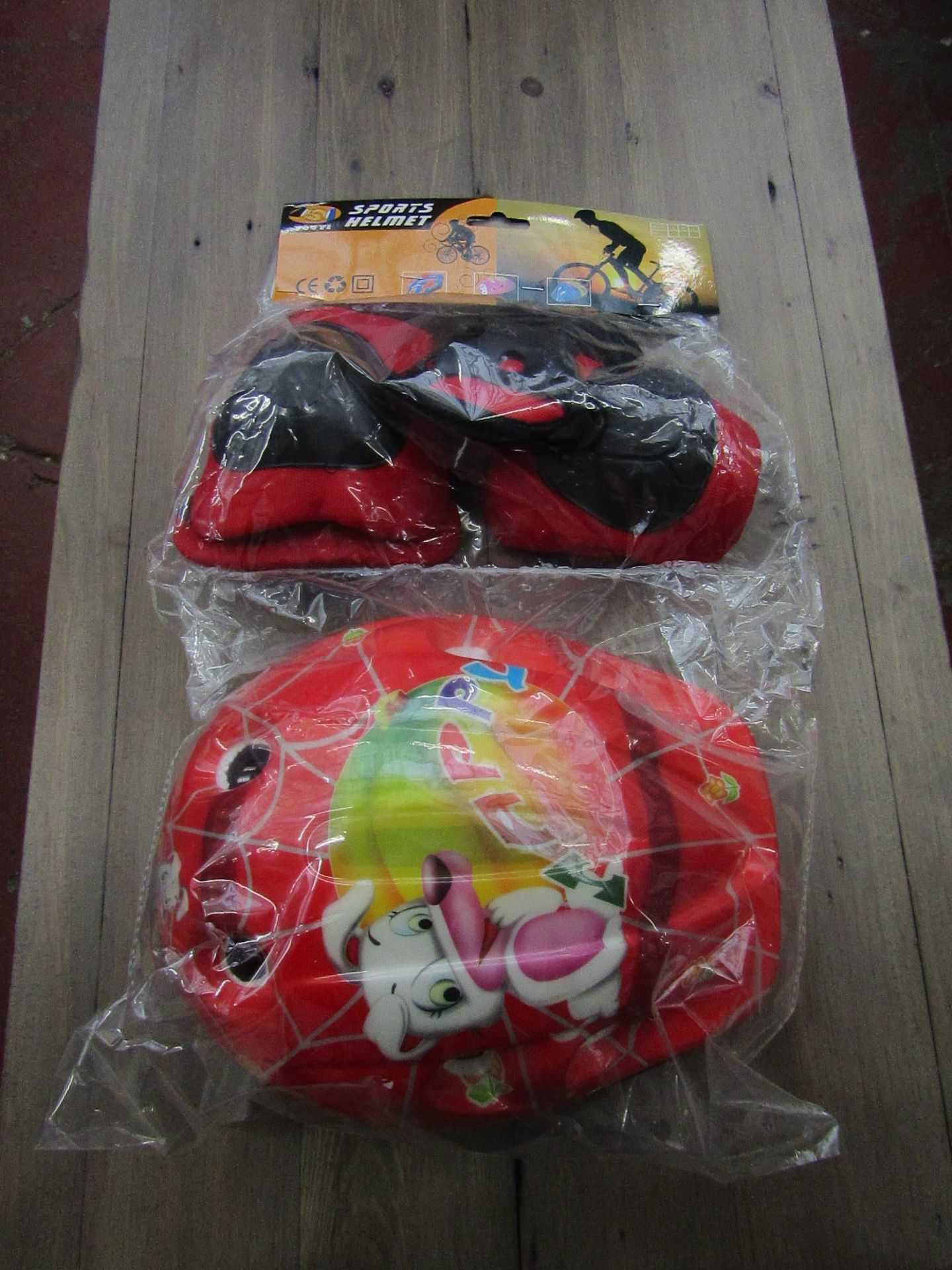 3X KIDS SPORTS SAFETY HELMET WITH KNEE AND ELBOW PADS, NEW AND PACKAGED.