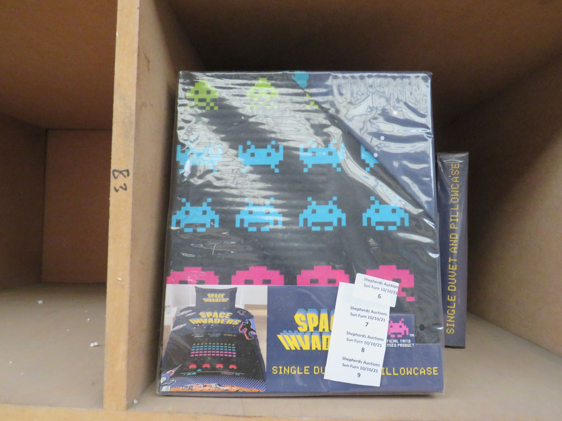 Space Invaders single duvet with pillowcase, new and packaged.