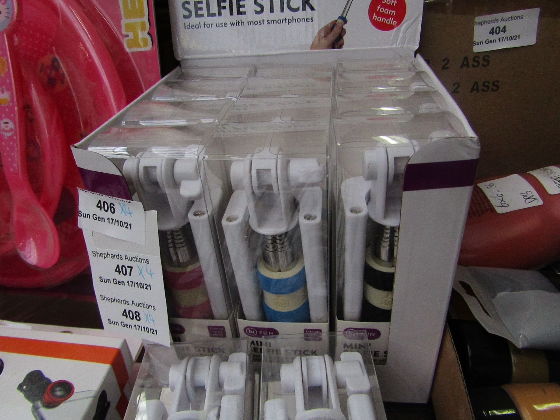 4x mini selfie stick - new & packaged.