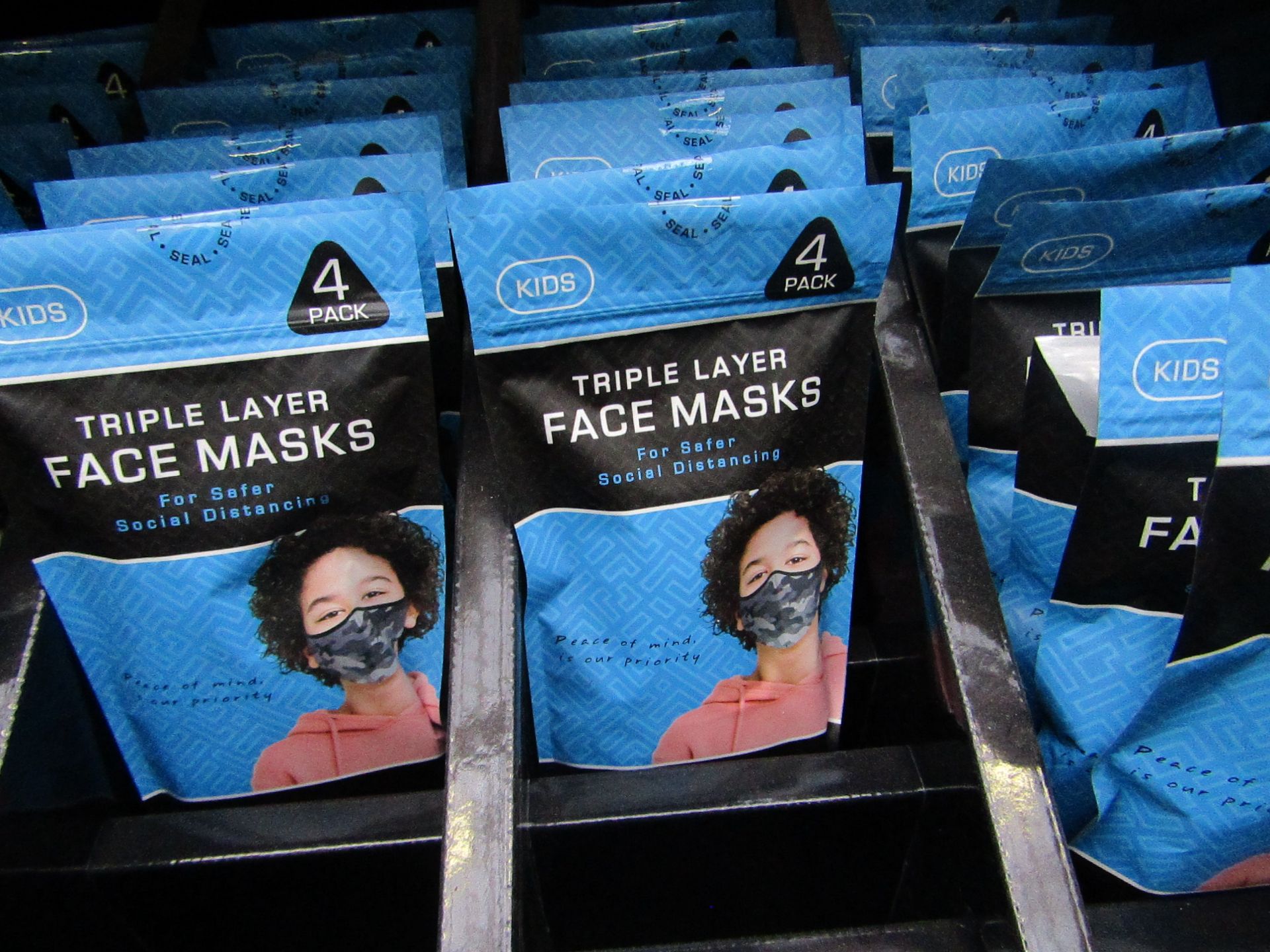 5x packs of 4 - triple layer face mask - new & packaged.