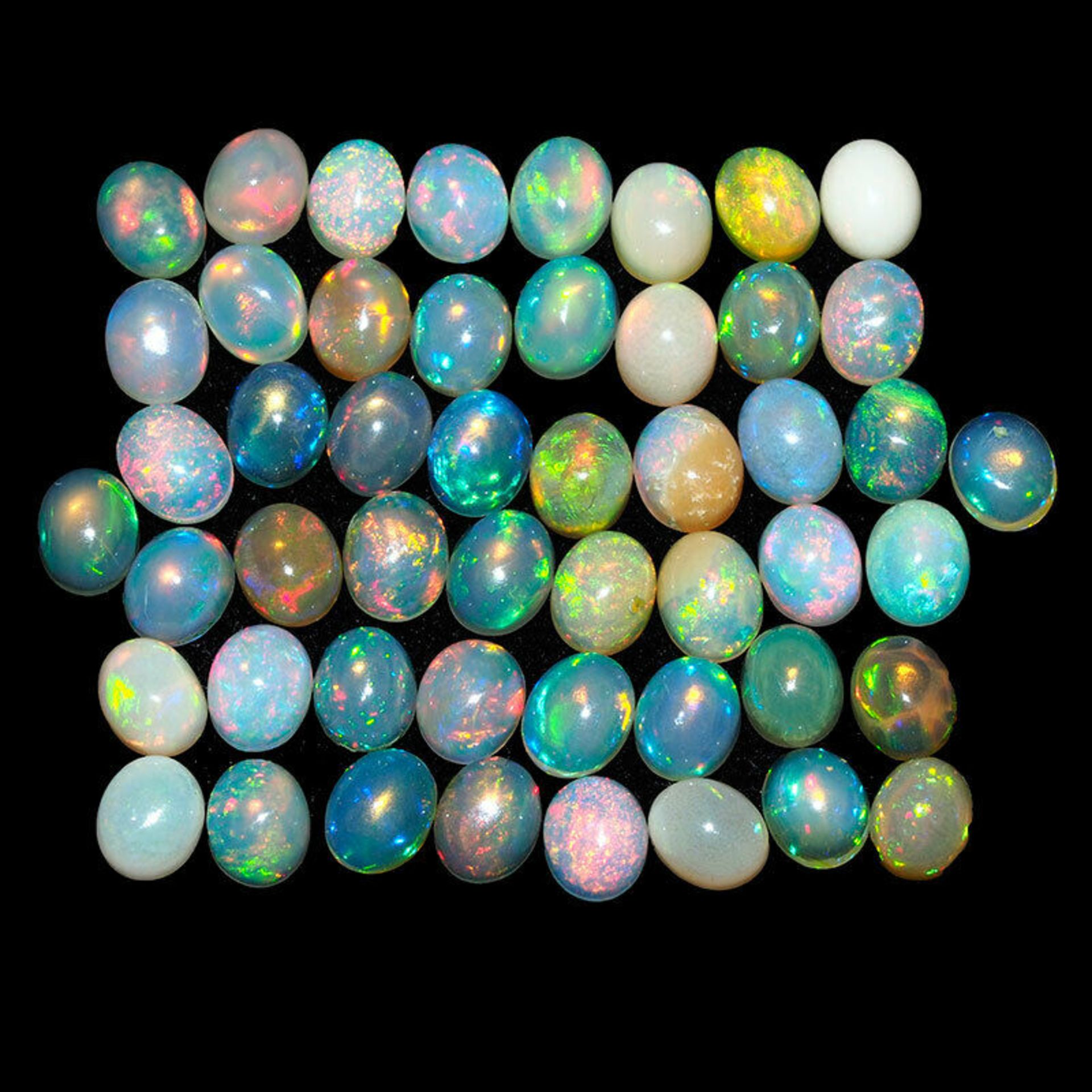 IGL&I Certified - Natural Ethiopian Opals - 4.11 Carats - 57 Pieces - Average retail value £2,089.