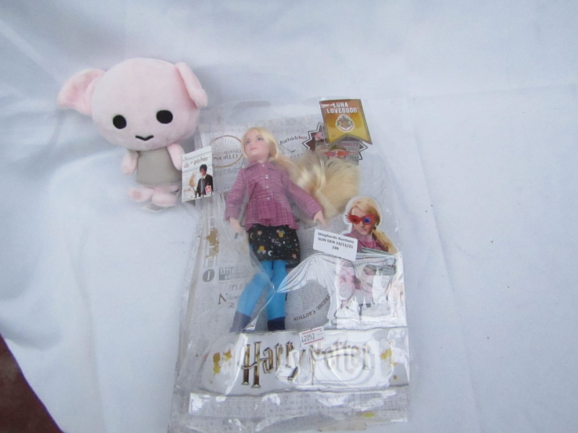 2x Items Being - 1x Wizarding World Harry Potter - Luna Lovegood - Packaging Abit Damaged However