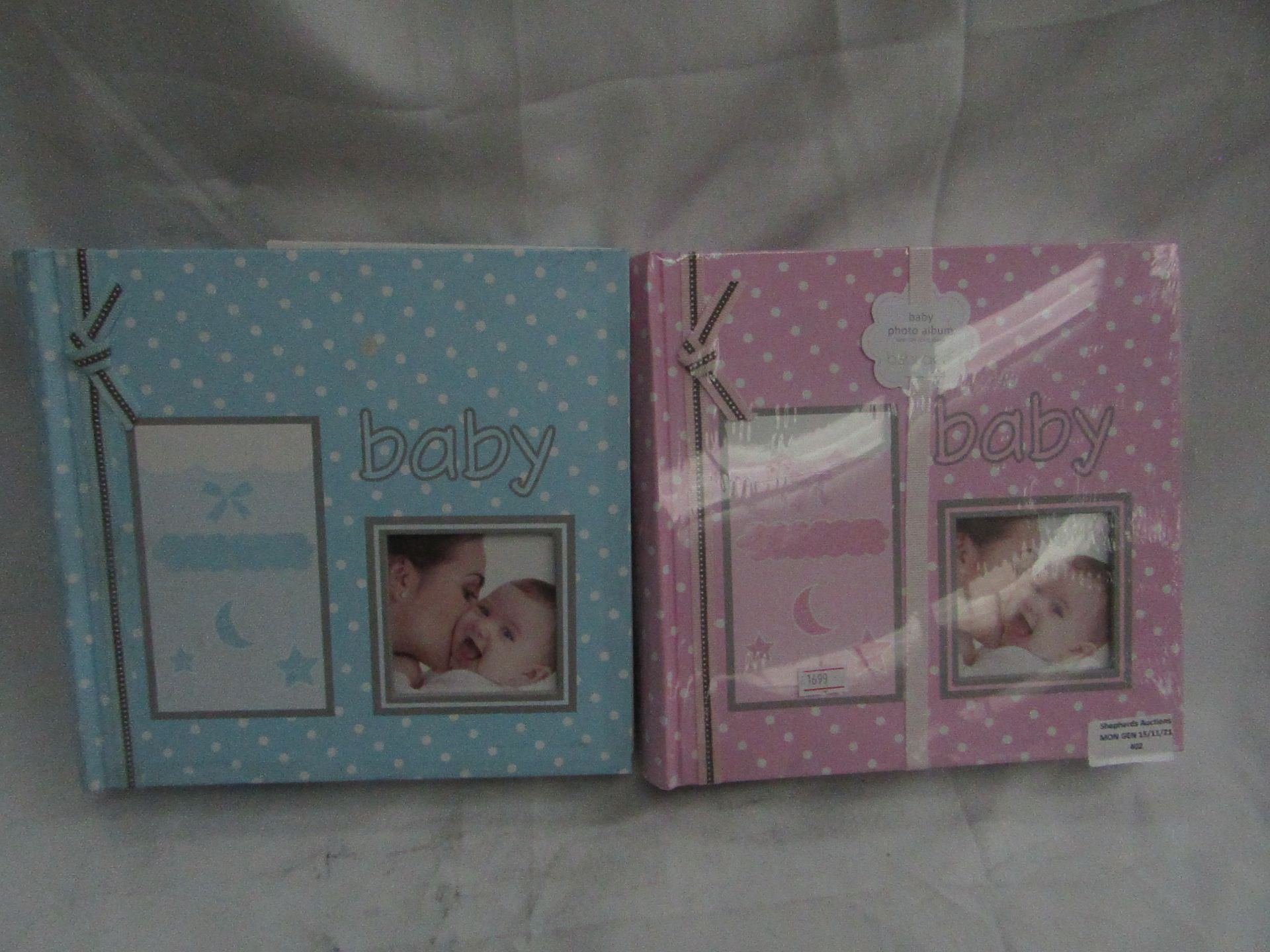 1x Babuqee - Baby Girl Photo Album - Unused & Packaged. 1x Babuqee - Baby Boy Photo Album - Unused &