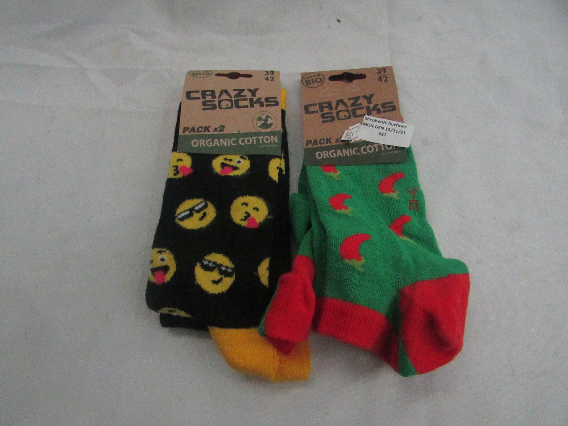 1x Crazy Socks - 2 Pairs - Size 39-42 - Unused. 1x Crazy Socks - 2 Pairs Emojis - Unused.