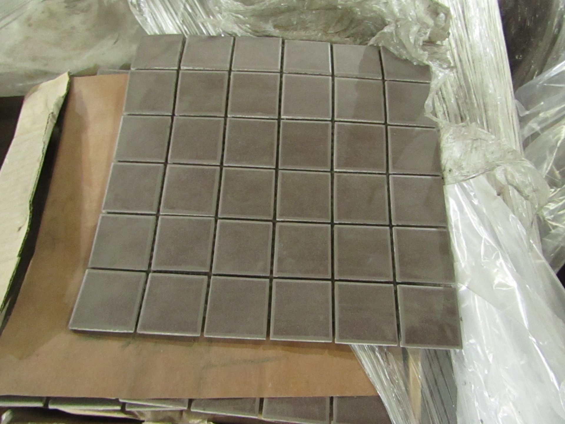 10x Boxes of 12 Vitra Sahara Mocha Mosaic 470x470mm tiles, brand new. Total RRP ?34.99 per box,