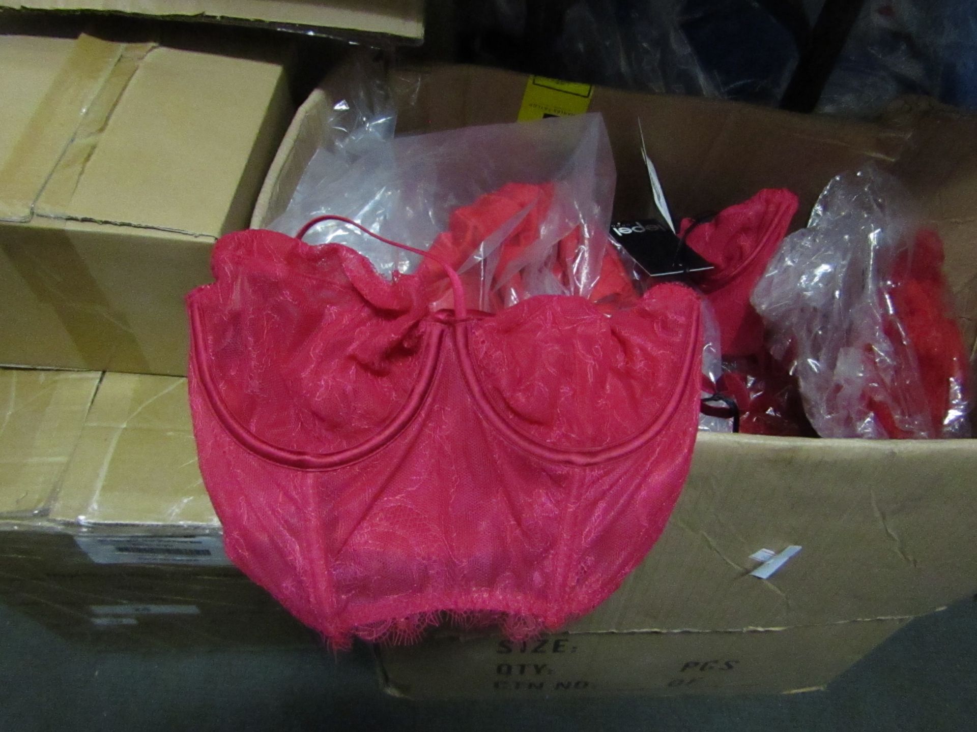 1x Box Containing Approx 20+ Women Bras - Colours & Sizes Vary - Unused & Packaged.