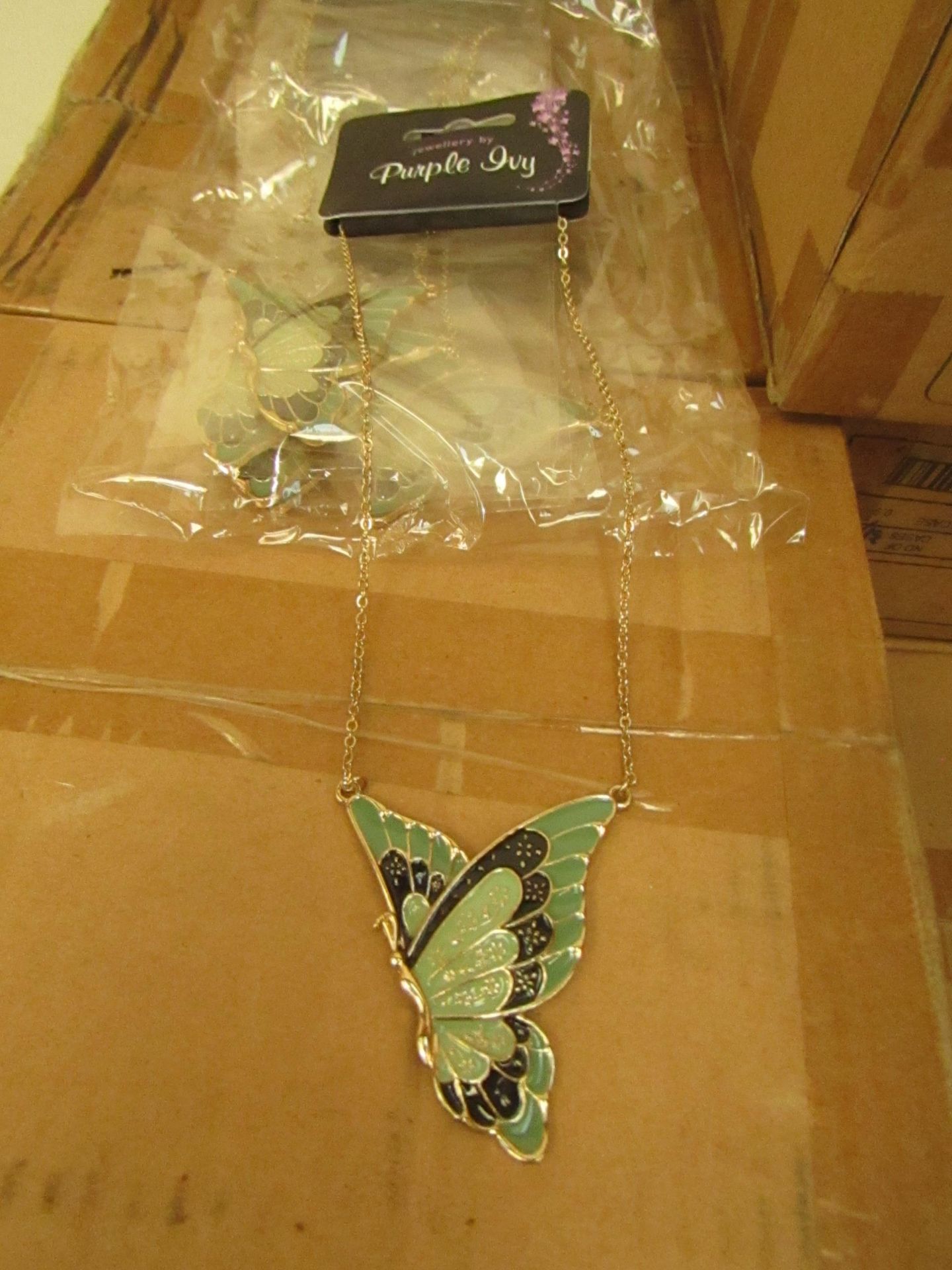 1x Box Of 24 Butterfly Necklace's - New & Boxed.