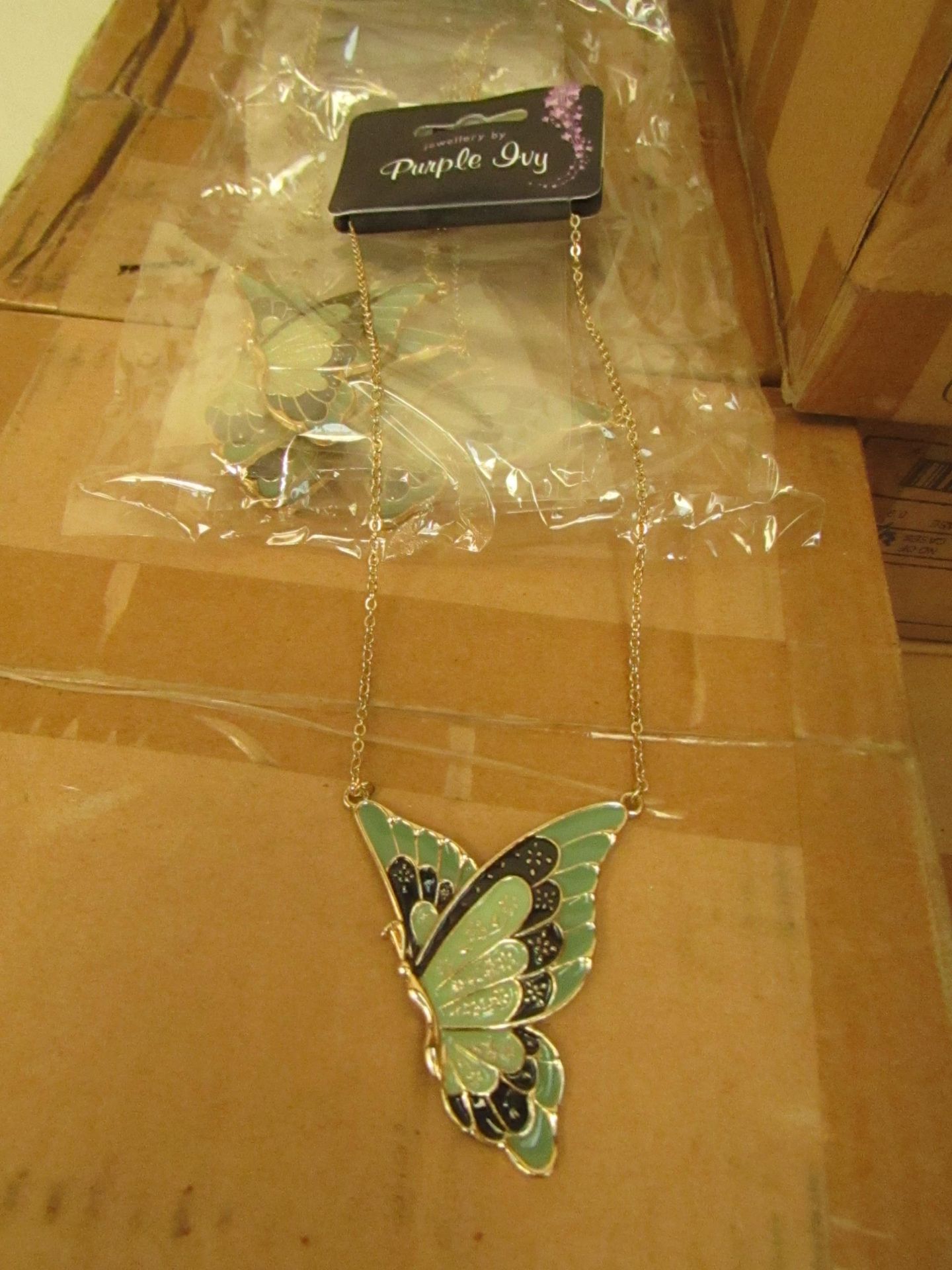 1x Box Of 24 Butterfly Necklace's - New & Boxed.