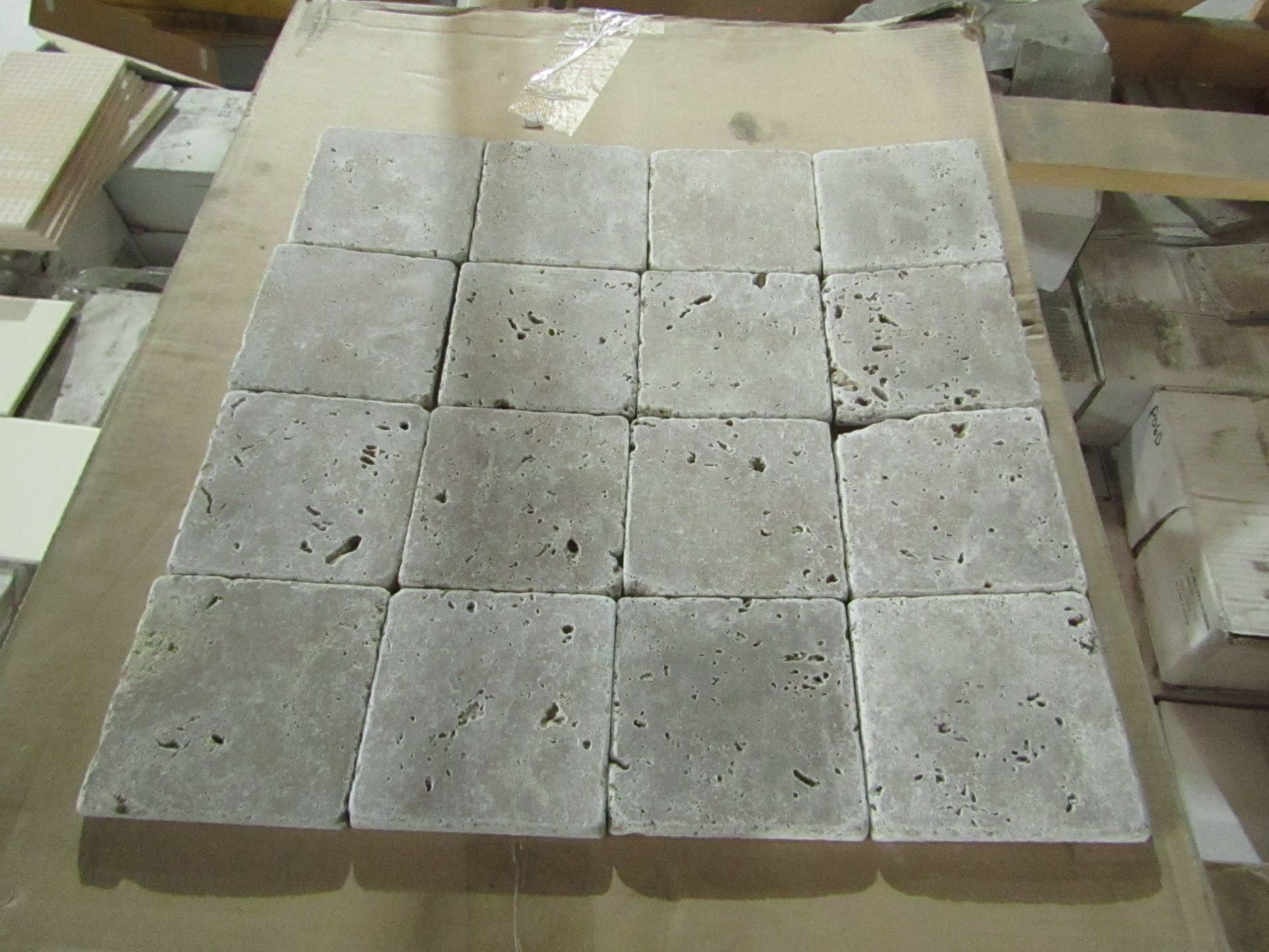 10x Boxes of 50 Tumbled travertine tiles 100 x 100mm, brand new. Total RRP ?40 a Box, Total RRP ?