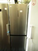 Hisense 60/40 Fridge freezer, tested working for coldness, in good condition but has a dent on the