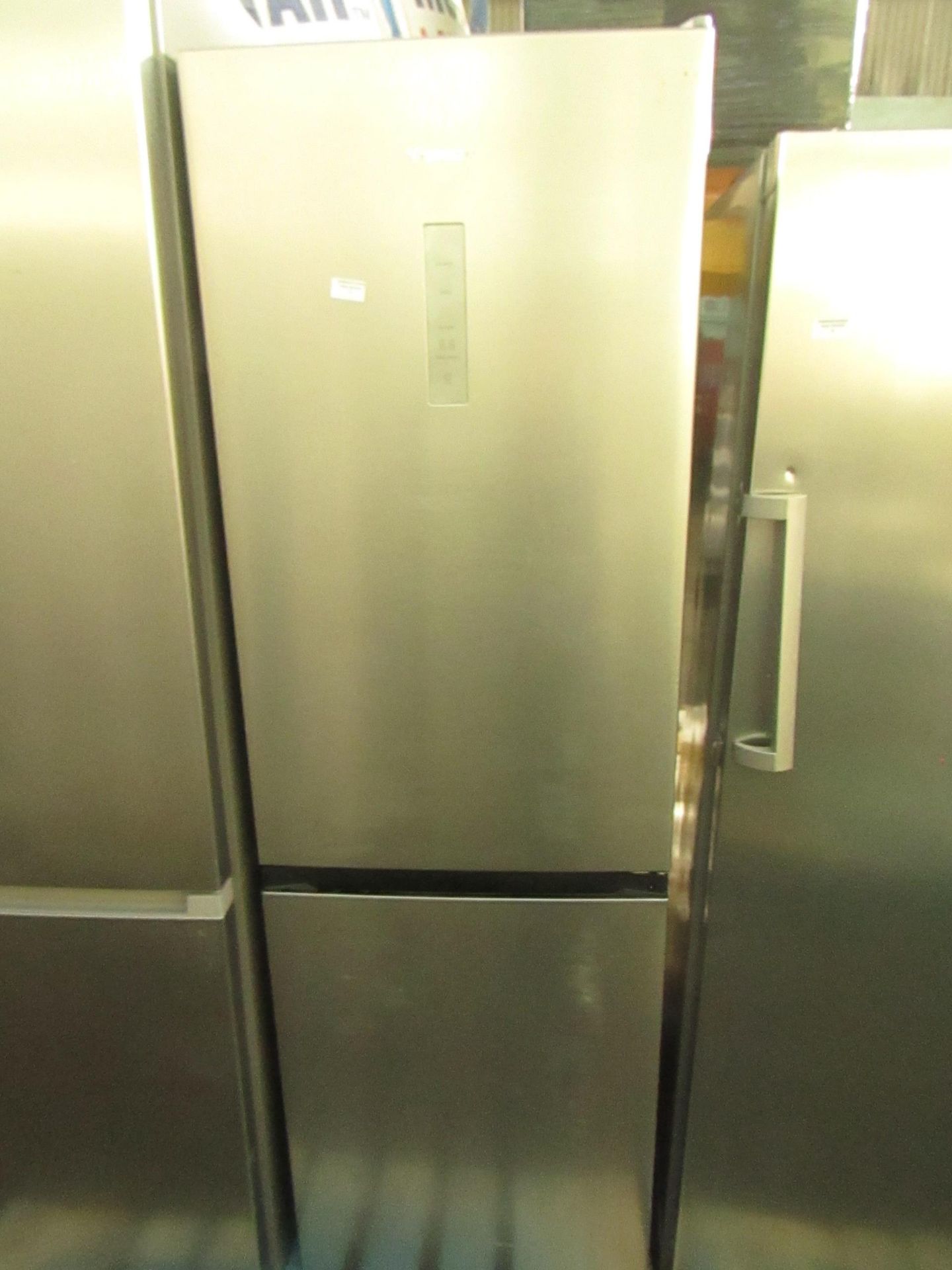 Hisense 60/40 fridge freezer, has marks on the front but clean inside